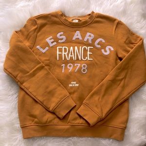 Burnt Yellow sweatshirt with writing detail